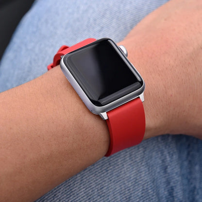 Person Wearing Apple Watch Sport Band Red