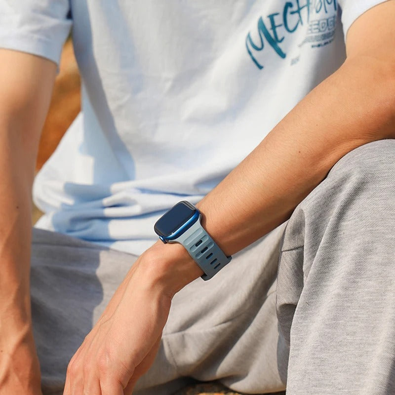 Person Wearing Light Blue Apple Watch Band