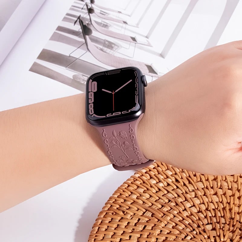 Person Wearing Flower Apple Watch Band Brown